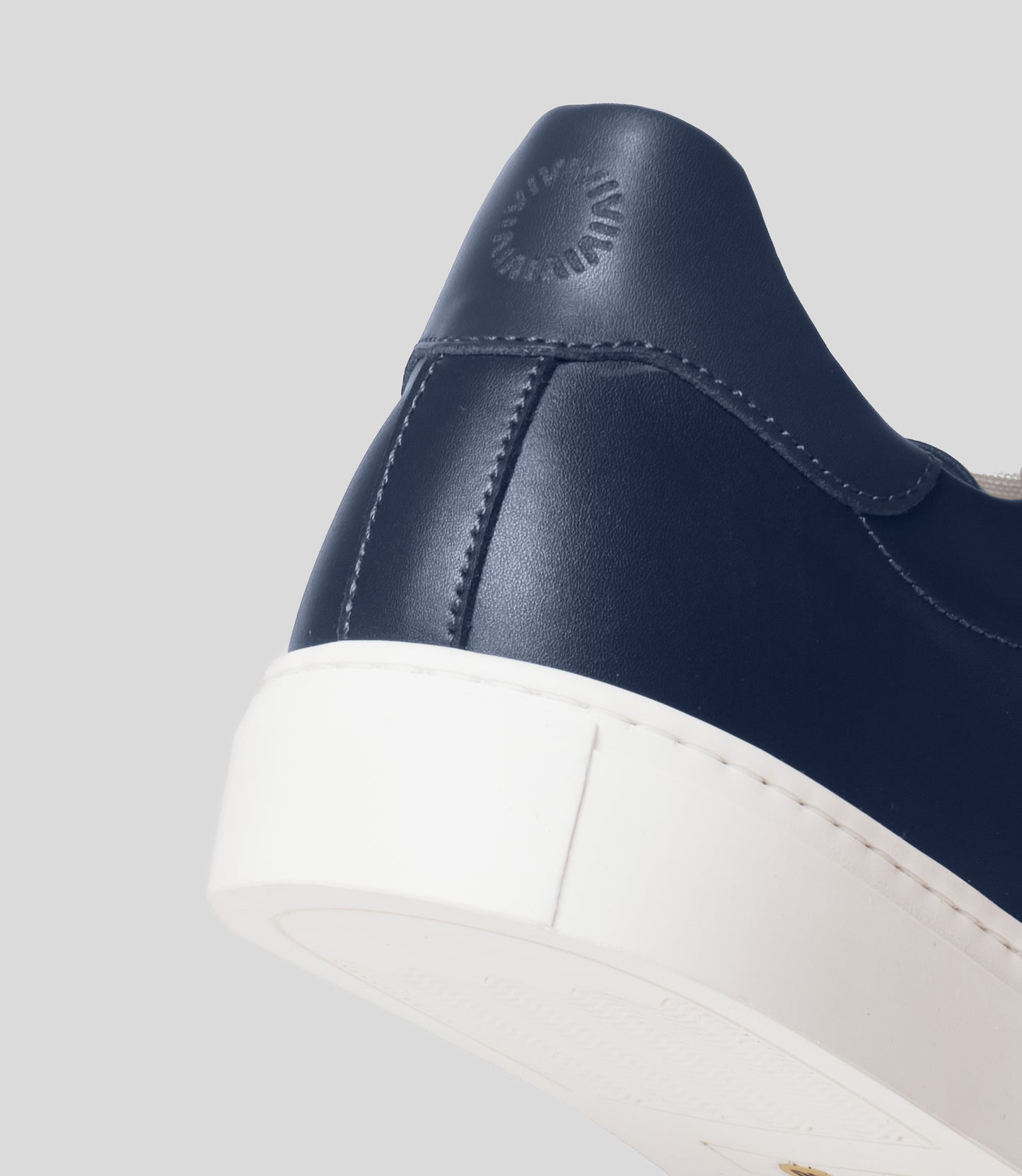 White vegan sneaker by Solari Milano, side view detail