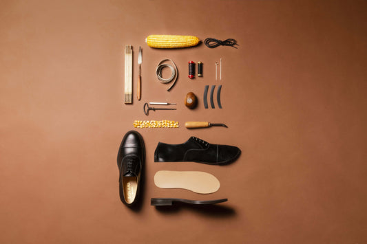 Collection of materials and tools for crafting shoes in the context of How to Make Vegan Dress Shoes.