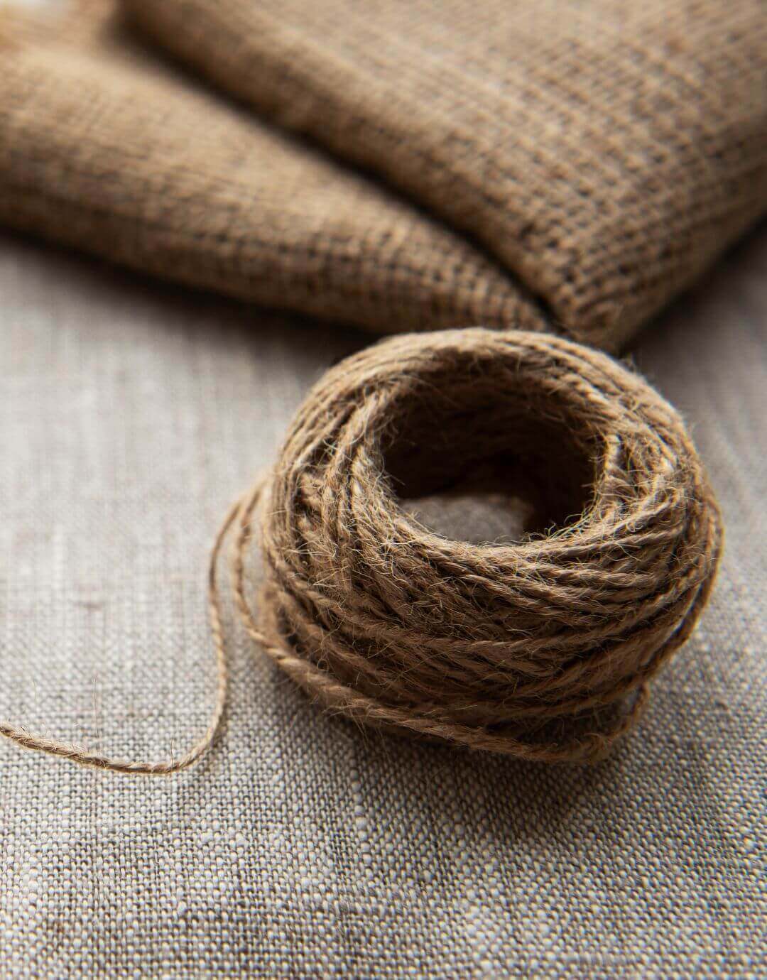 Advantages and properties of Hemp fabrics with natural hemp twine and fabric background.